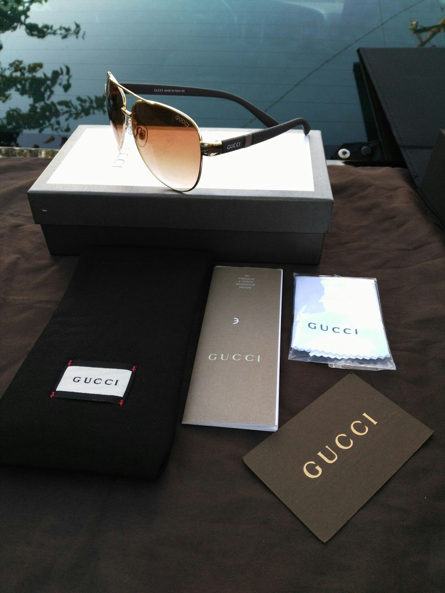 Brown designer glasses ( box and case and gift bag extra)