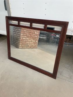 Glass mirror, 48 inches wide x 39 inches