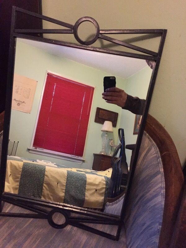 Wrought iron framed mirror