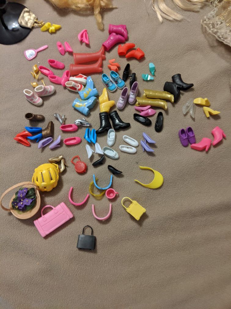 Barbie doll lot. Clothes,shoes, accessories lots of dolls