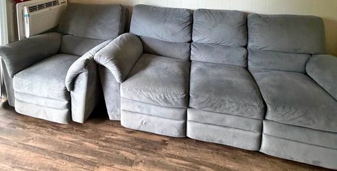 Gray recliner couch with matching recliner chair good condition clean we sell all the time delivery $40 local
