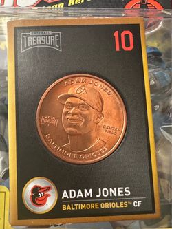 2018 Baseball Treasure commemorative copper coin card featuring Adam Jones of the Baltimore Orioles.