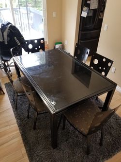 Glass Dinner Table Including 6 chairs