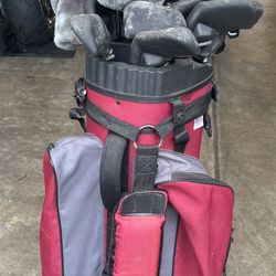 Top Flite golf club set with club covers and cart