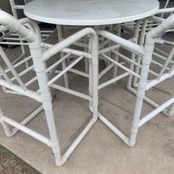 outdoor pvc pub table and five pvc chairs 