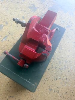 All items $25 storage box, bench vise and car duster