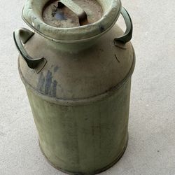 Antique milk jug