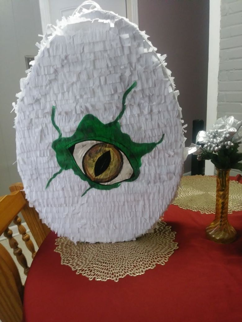 Dinosaur egg pinata