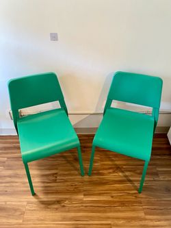 Green plastic Ikea dining room chairs (set of 2)