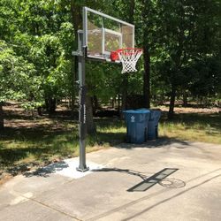 Goaliath 54 inch in ground basketball hoop, adjustable basketball court