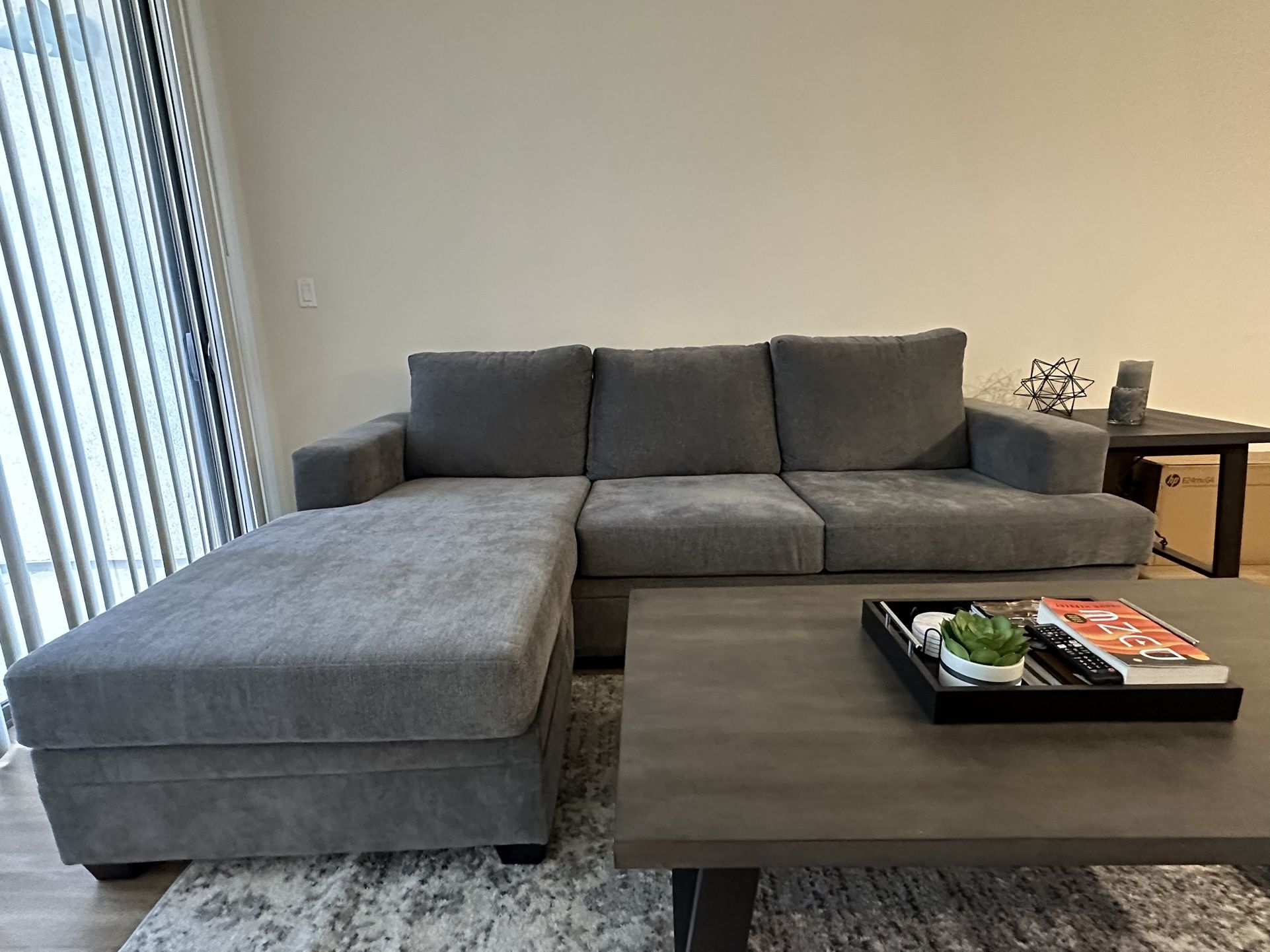 Living Spaces 97 Inch Sofa With A Reversible Chaise for Sale in