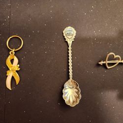 vintage Pikes Peak souvenir spoon, pink enamel breast cancer awareness ribbon keychain, heart with an arrow brooch. $3 per each 