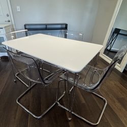 4 Seater White Dining Table With Clear Chairs Included 