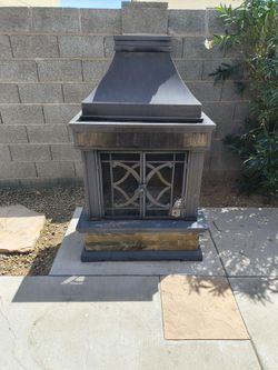 Wood burning fire pit