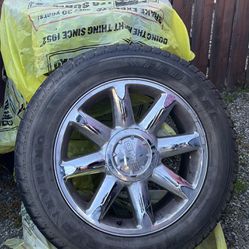 Set of 4 studded tires on rims 6 lug gmc p275/55R20