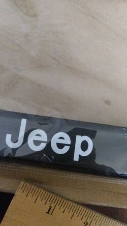 NEW SET OF 2 JEEP METAL FRAMES LICENSE PLATE