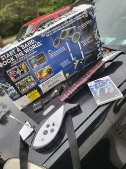 Nintendo wii Rockband set
Drums open box complete mint with dongle
Guitar with Dongle
Mic
And Game