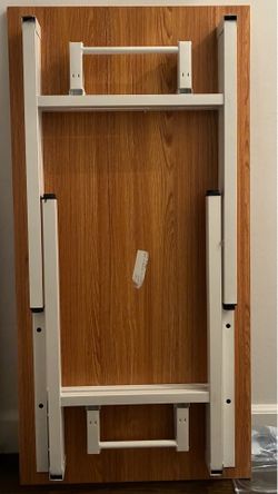 Desk with folding legs
