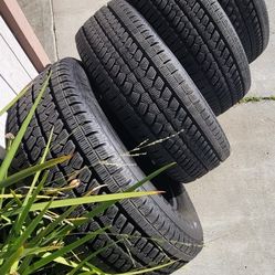 Bridestone Tires lt275 65r20 Almost New.. 