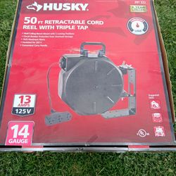 Husky 50 ft. Retractable Extension Cord Reel with Triple Tap, 14-Gauge, 13-Amp, Wall/Ceiling Mount