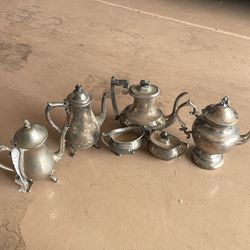 4  vintage silver teapots