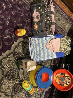 Baby’s things lots of it cloths baby shoes shirt baby Jordan Stroller with car seat to