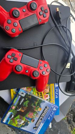 Play station 4 slim with controllers and games  ps4