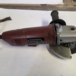 Corded angle grinder with side handle. Chicago Electric