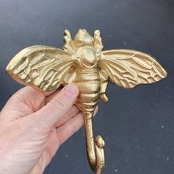 Rare Gold Cast Iron Bee Hook