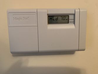 Brand new Thermostats in Box.