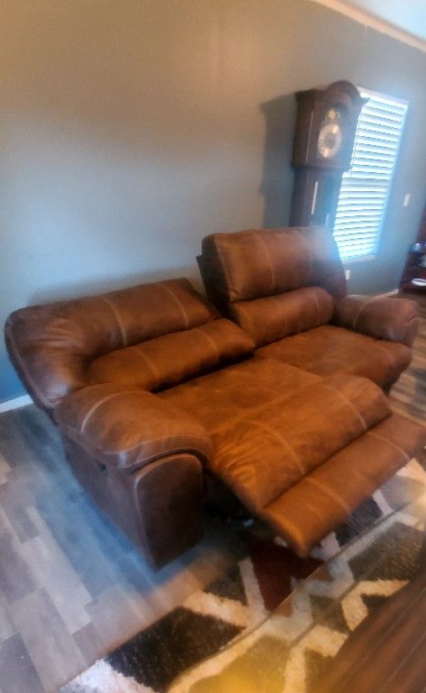 Leather Couch With Both Sides Recline Flat, Never Used Always Had Plastic On It
