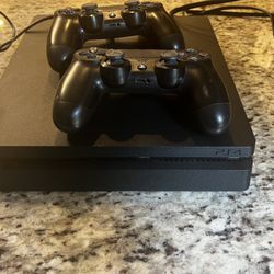 PS4 And 2 Controllers