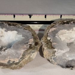 A Positively Stunning spilt and polished Las Choyas geode pair with stunning matching patterns and white crystal druzy. 