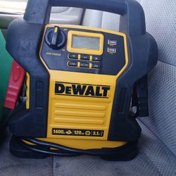 Dewalt jump starter with various features for lighting, charging, airing your tires and more