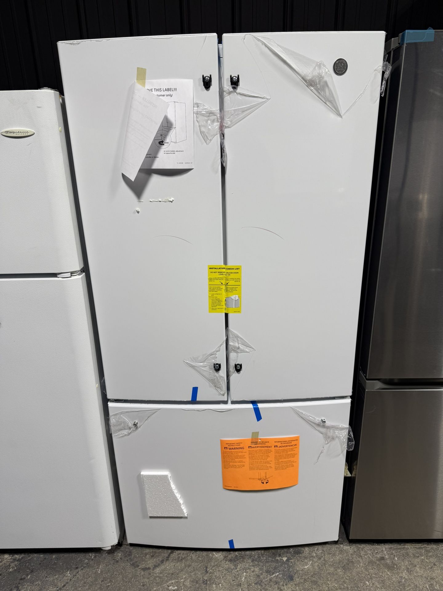 Brand new GE 24.7 cu. ft. French Door Refrigerator in White, ENERGY STAR