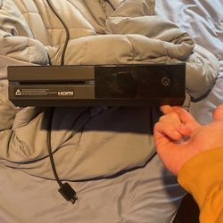 Xbox one with power cord, box, and hdmi cable