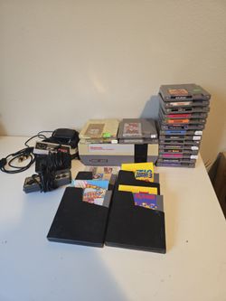 NES Console with controllers and 22 games. Works!