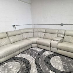 Power Reclining Leather Sectional
Delivery Available!