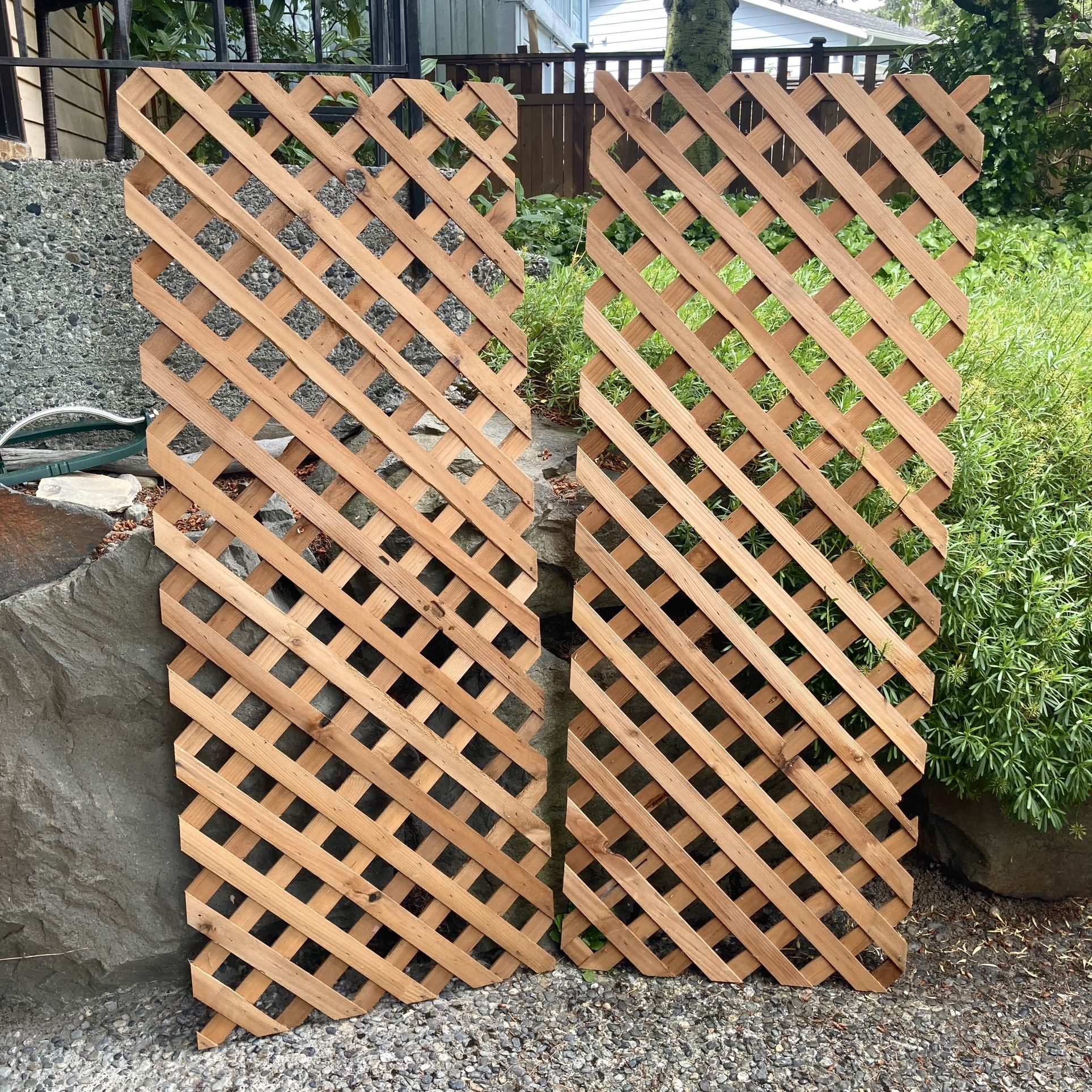 Two 2x5ft cedar lattice pieces (could be made into trellises or privacy screen)