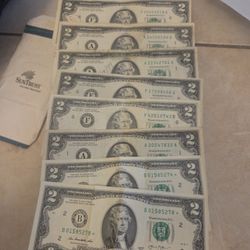 8 Two Dollars Bills 