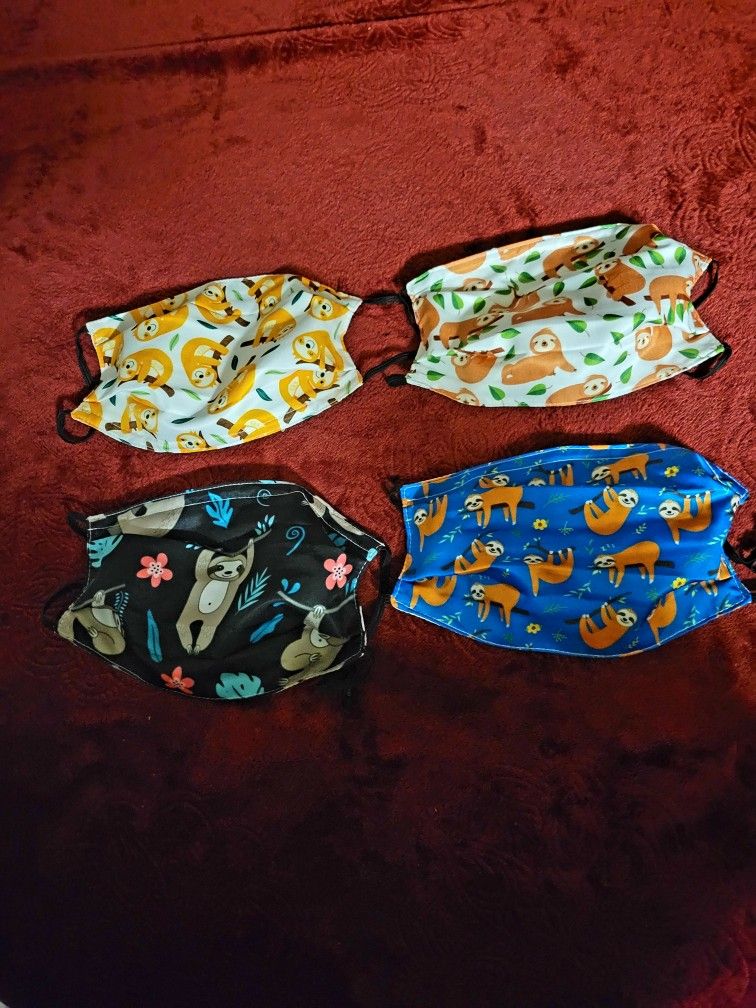 NWT YELLOW SLOTH ADULT FACE MASK 4 PACK UNISEX SIZE ONE SIZE FITS ALL