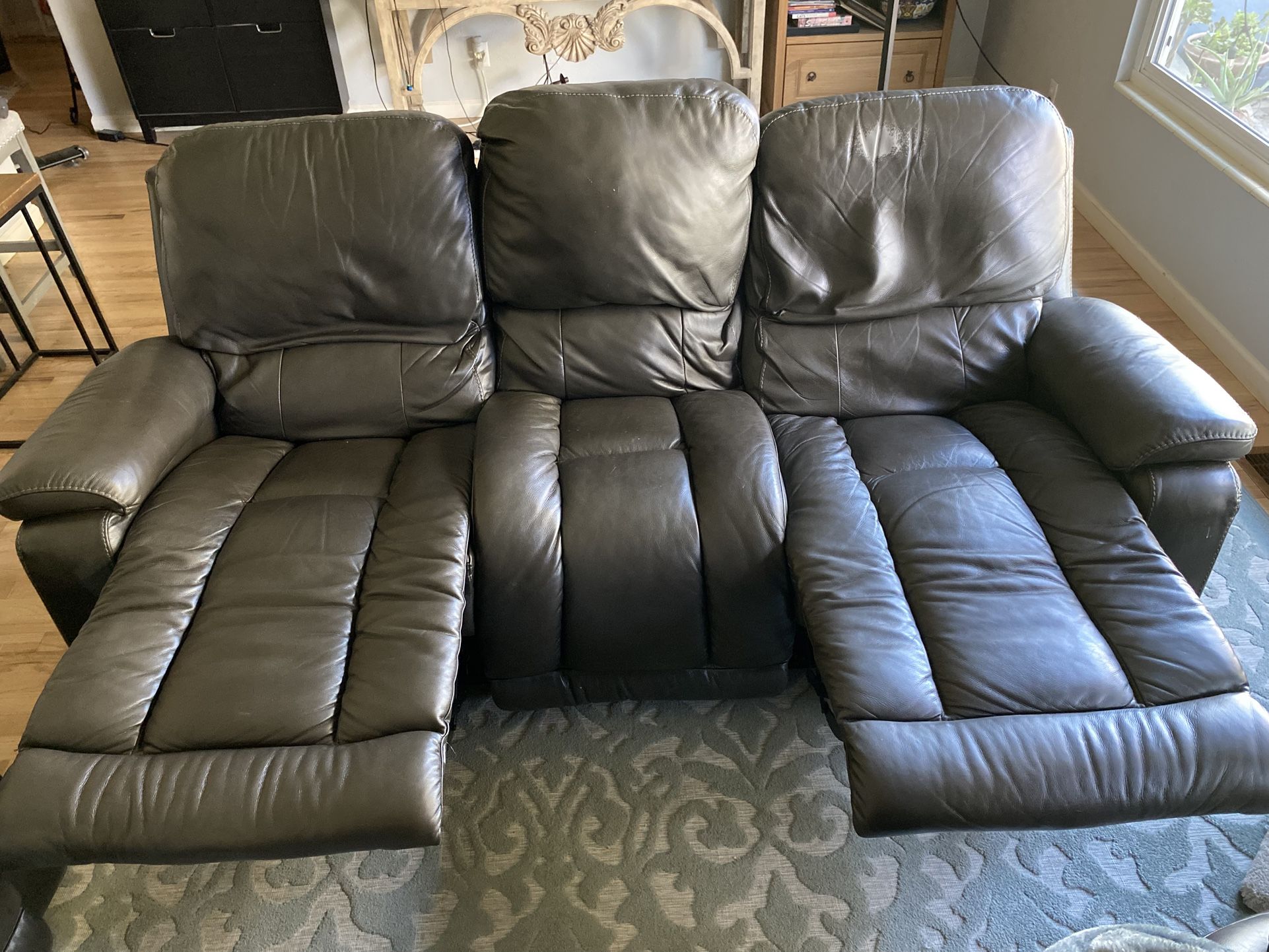 Gray Leather Reclining Sofa