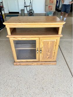 TV stand /cabinet - 34” wide by 35” height by 21” depth