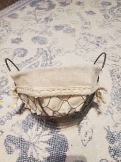 Small metal basket with canvas lining