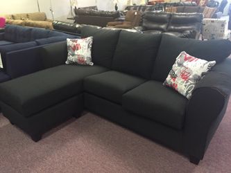 Black sectional with reversible chaise