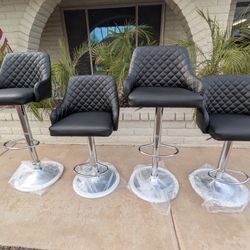 Brand new adjustable height bar stools only $80 Each