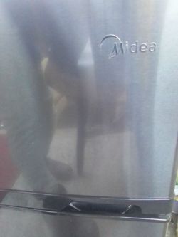 Black and grey midea mini fridge