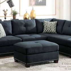 Midnight Blue Pinhead Sectional with a matching ottoman