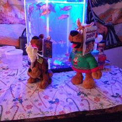 Scooby-Doo. Plushies. One Halloween And One Christmas Singing Scooby.  Both $8. New. 