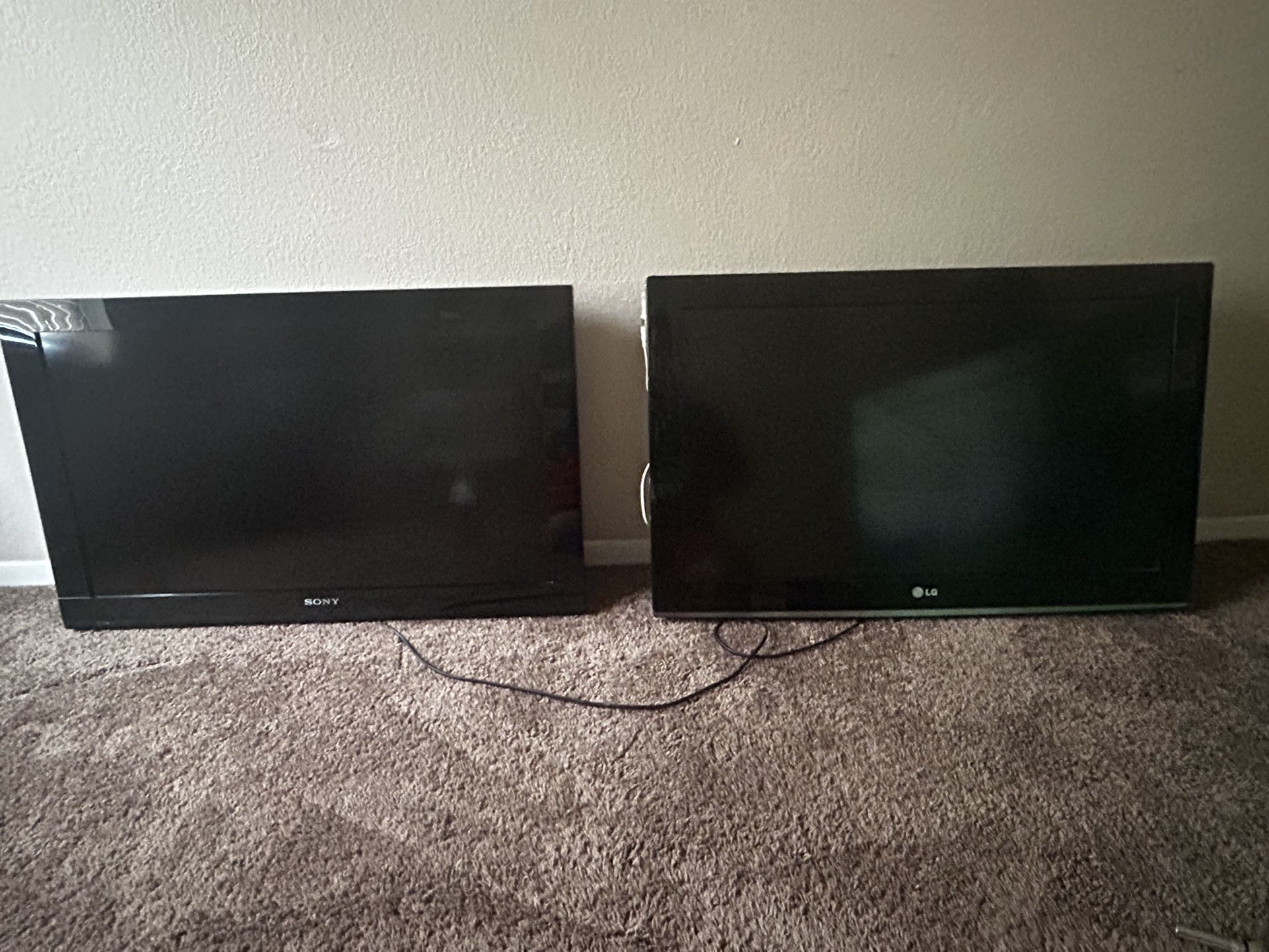 Two 32 Inch TVs